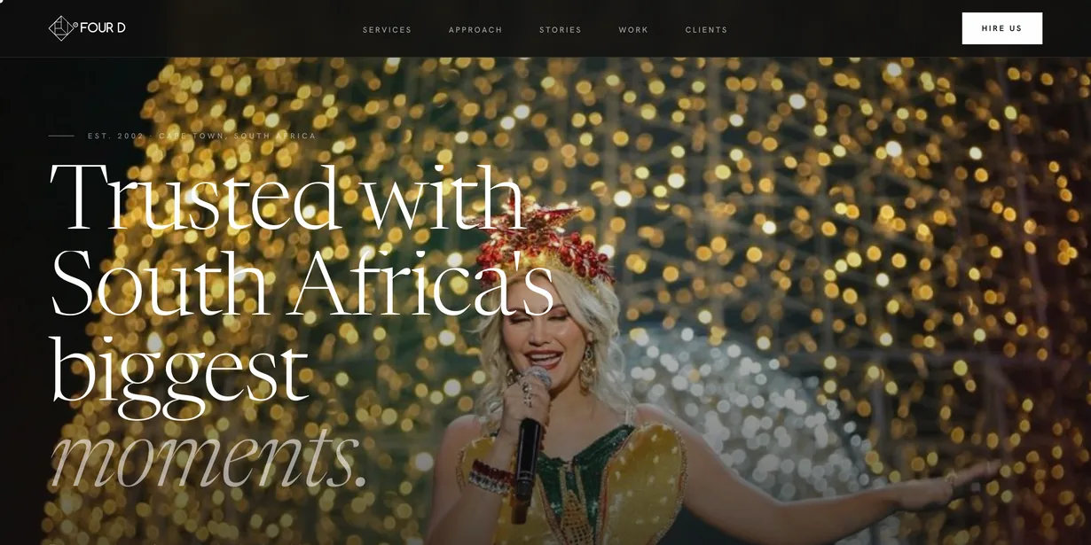 The 4D Collective homepage, showing the hero headline over a concert photograph